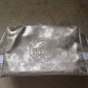Gold distressed Orlane Paris makeup/cosmetic bag